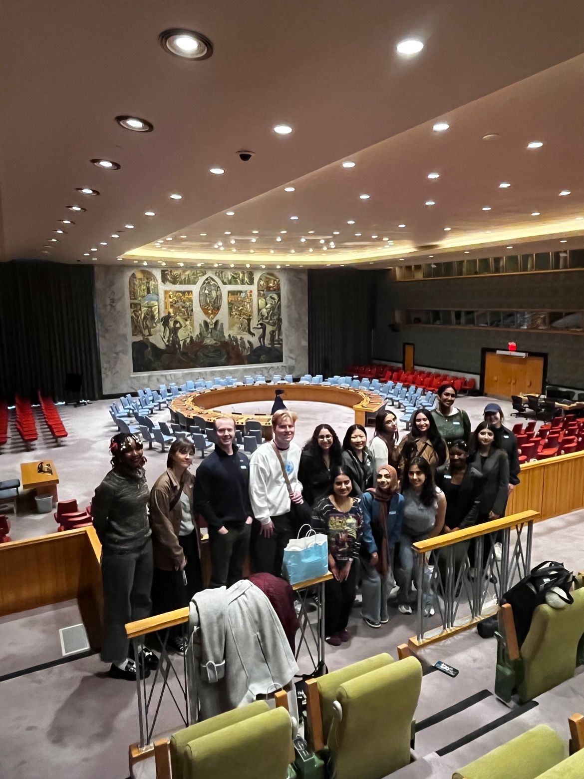 Quinlan Ramble students gather for a photo inside the Security Council chambers at the United Nations headquarters in New York.